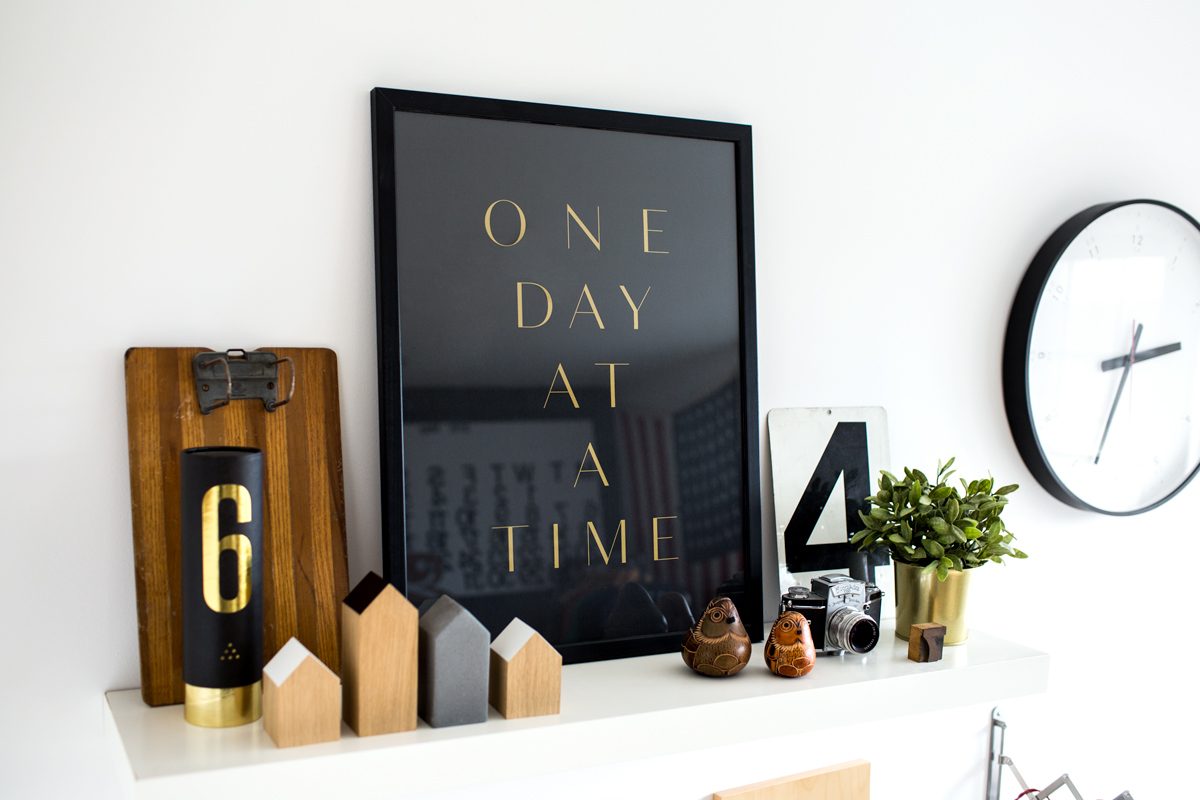 Image of a picture frame above a fireplace